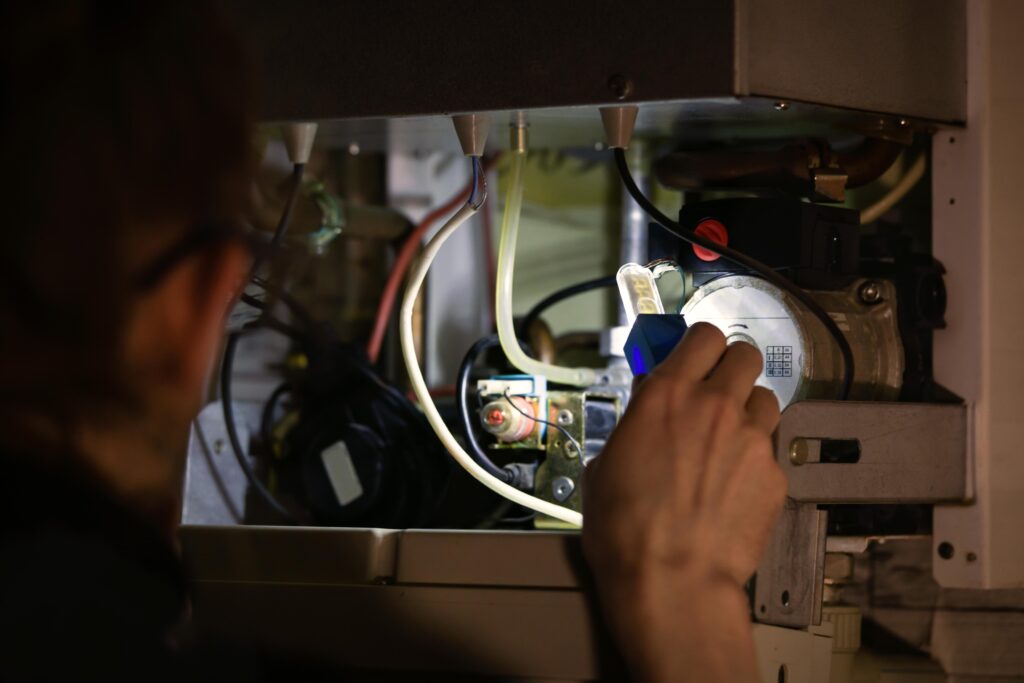 Gas Engineer Working in Dark